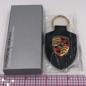 Porsche crest keychain in box and seal